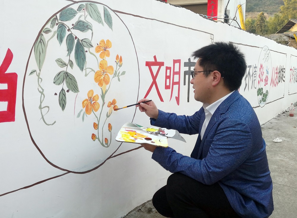 信息工程系黨總支開展“ 展現(xiàn)青春風(fēng)采 繪就美麗鄉(xiāng)村”文化墻繪制公益活動